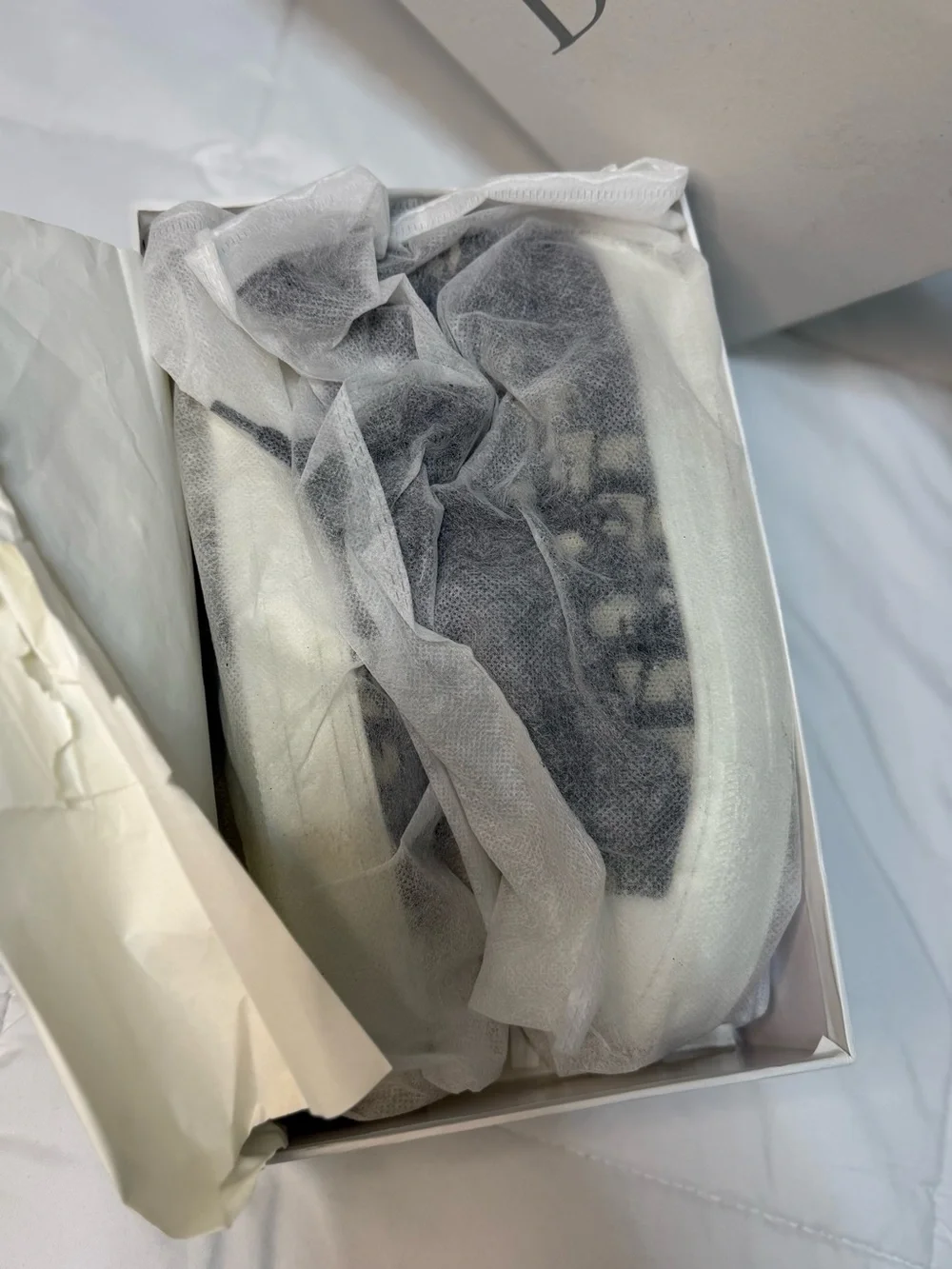 Dior Mid-Top Sneaker in Navy & Cream